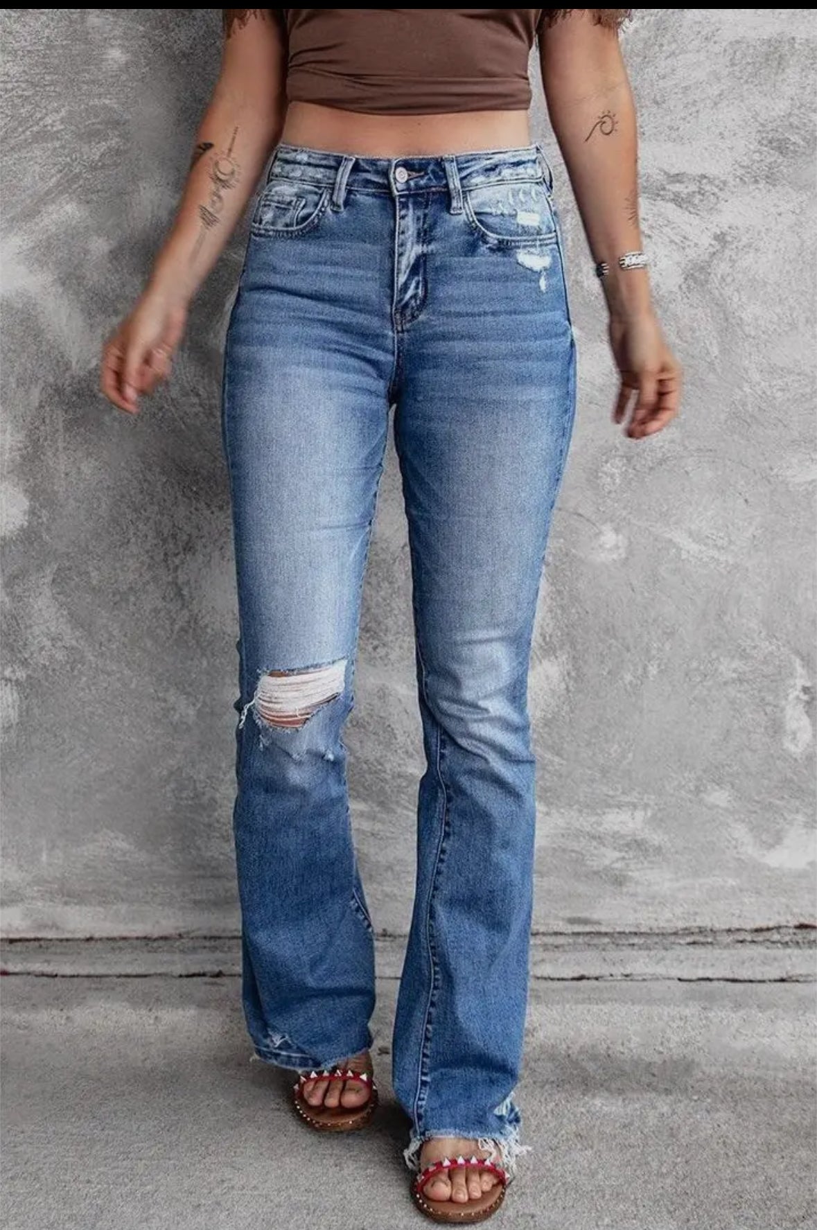 High-rise trousers stretch raw ripped jeans