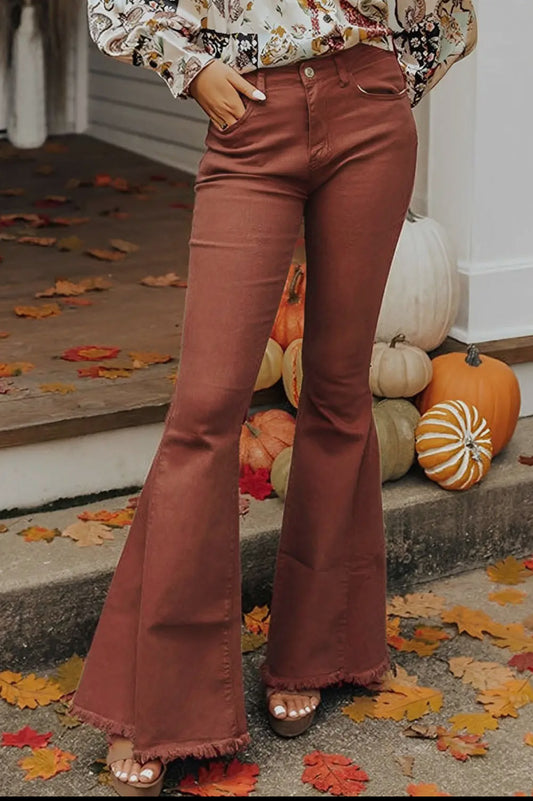 High waisted raw hem flair jeans in burnt brown
